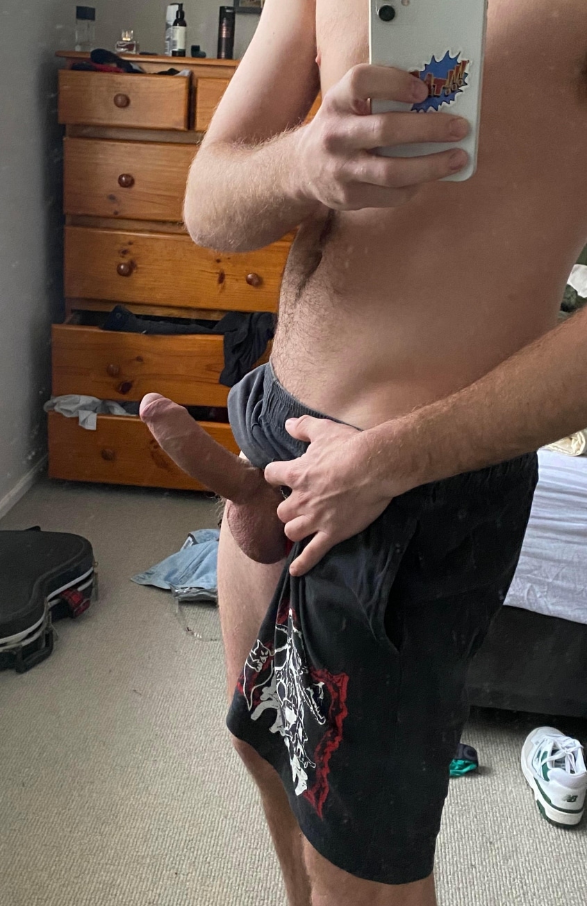 Hard cock out of shorts