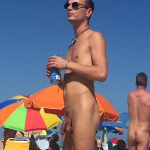 Naked Man At A Beach