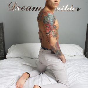 Tattooed boy with a big uncut cock