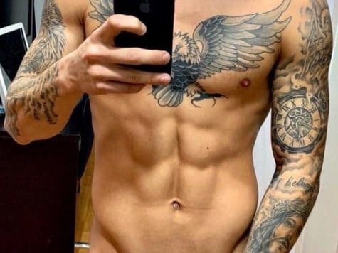 Tattooed man with shaved penis