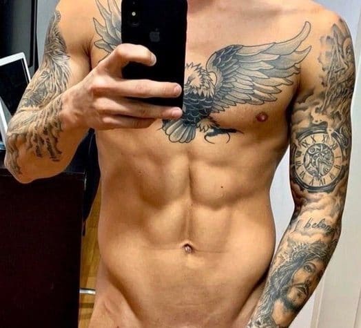 Tattooed man with shaved penis