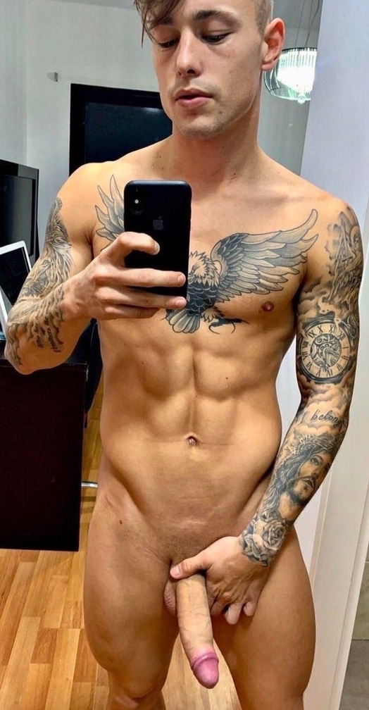 Tattooed man with shaved penis