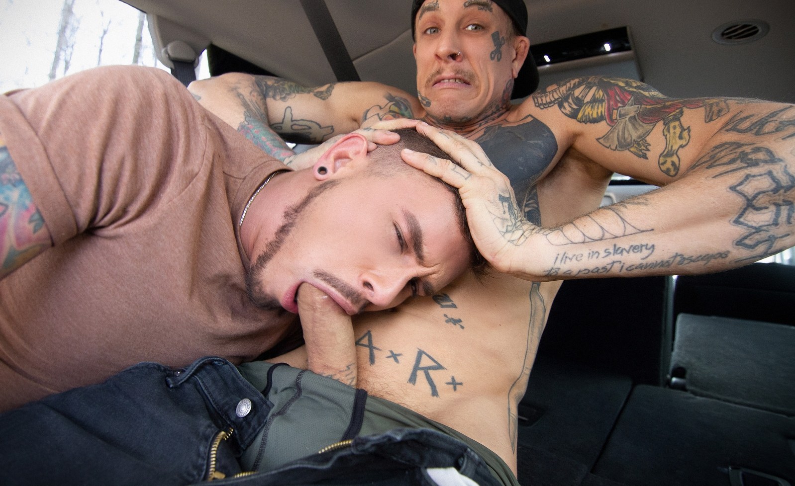 Tattooed men having hardcore gay sex